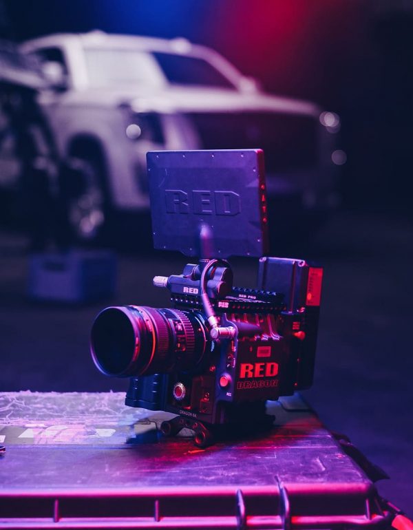 black-camera-with-red-case